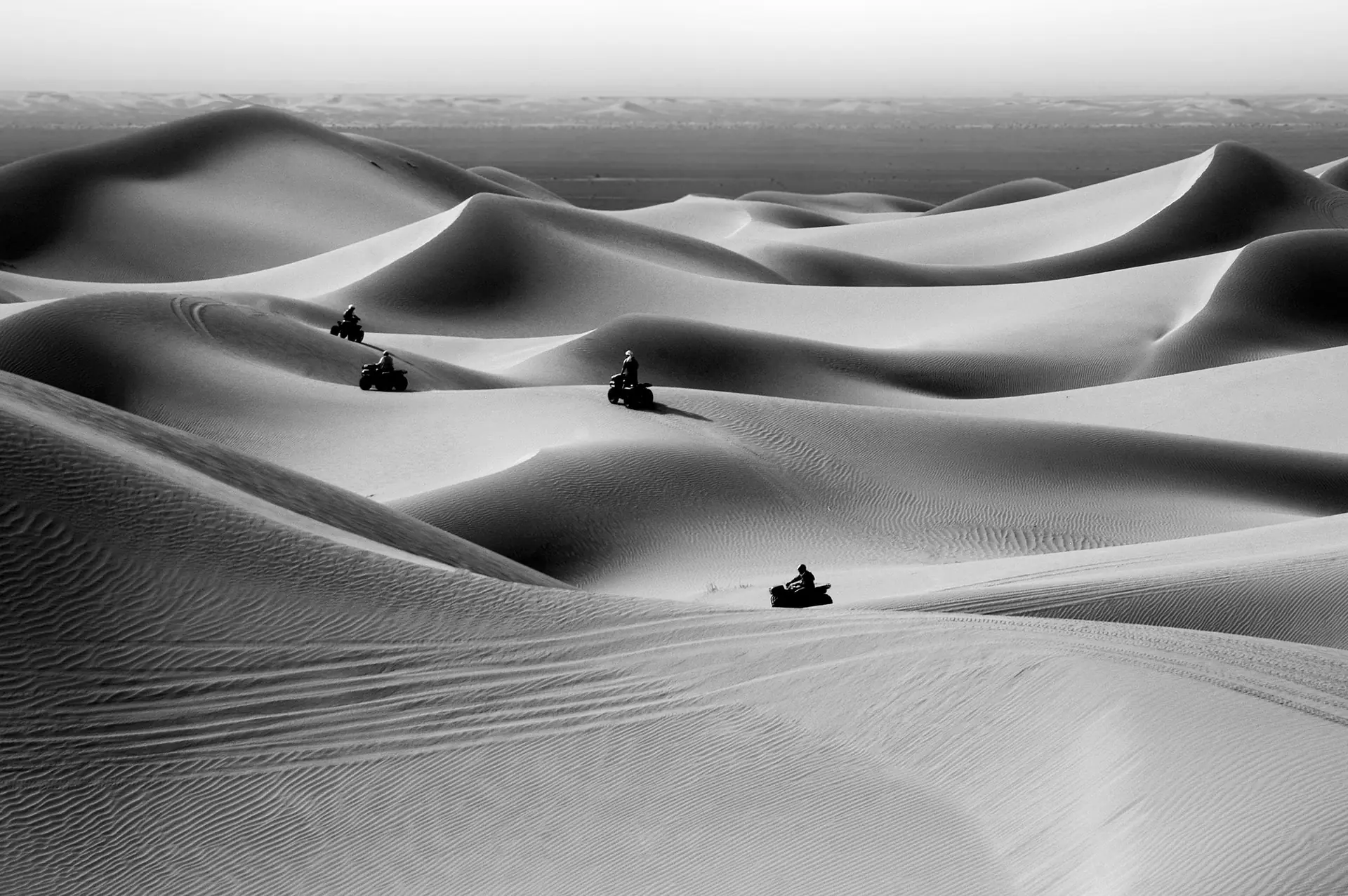 Explore the stunning Sahara dunes with quad bikes in Merzouga, Morocco.